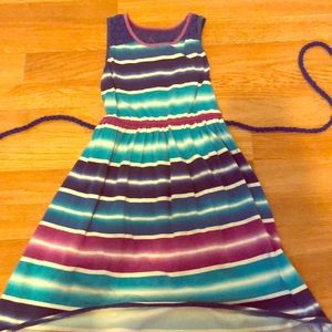 Blue and purple dress with a rope tie and a lace .